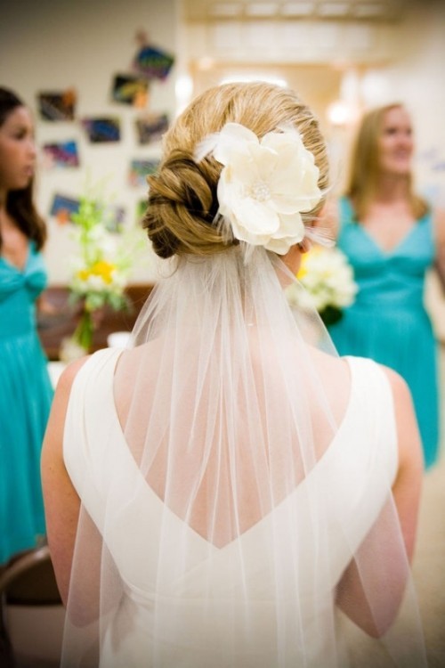 Свадебная прическа с цветком фото 15